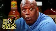 Shaq Tries to Not Make a Face While Eating Spicy Wings still