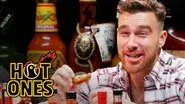 Travis Kelce Gets Woozy Eating Spicy Wings still