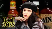 Rosalía Can't Stop Laughing While Eating Spicy Wings still