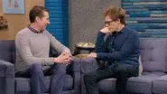 Kevin Bacon Wears a Blue Button Down Shirt and Brown Boots still
