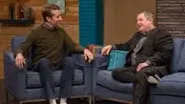 Patton Oswalt Wears a Black Blazer and Dress Shoes still
