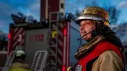 Dangerous fire on gas station roof still