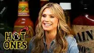 Heidi Klum Strikes a Pose While Eating Spicy Wings still
