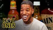 Kid Cudi Goes to the Moon While Eating Spicy Wings still