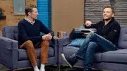 Joel McHale Wears a Navy Zip-up and High Tops still