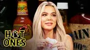 Khloé Kardashian Holds Back Tears While Eating Spicy Wings still
